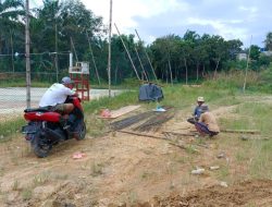 Desa Sinunukan III Bangun Tribun Lapangan Voli