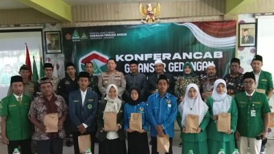 Foto bersama Forkompimcam Gedangan bersama seluruh tamu undangan Konferancab Ansor Gedangan di Auditorium SMK ITABA Gedangan.