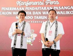 PASLON PDI-P ANDREI ANGOUW DAN RICHARD SUALANG MENDAFTAR DI KPU MANADO