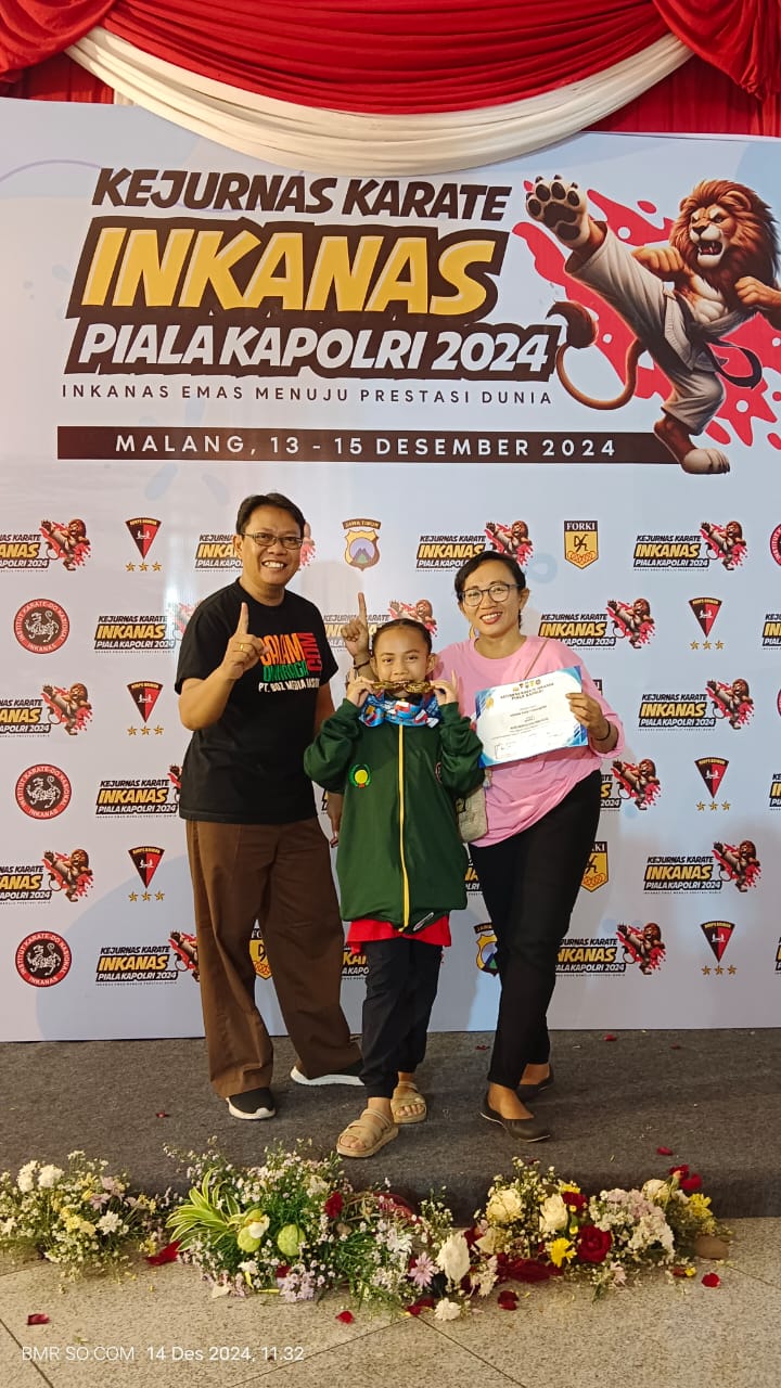Foto: Kedua orang tua Ratri yang selalu setia mendampingi saat ia bertanding.