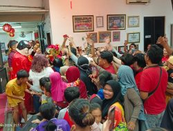 DEWA CAI SHEN YE DAN LONTONG CAP GO MEH DALAM PERAYAAN IMLEK