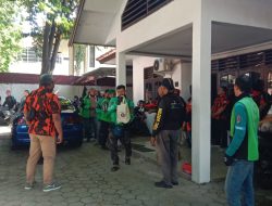 HUT ke-15, GRIB Jaya Gresik Gandeng Pemuda Pancasila Bagikan Paket Sembako untuk Driver Ojol