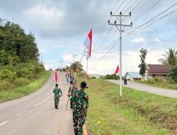 Penancapan Tiang Bendera Merah Putih di Perbatasan RI-Malaysia, Wujud Sinergi TNI, Polri dan Masyarakat Badau